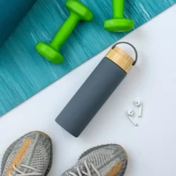 JoyJolt Glass Water Bottle with Carry Strap & Non Slip Silicone Sleeve - 20 oz - Grey -WATER BOTTLES Sales unnamed file 4163